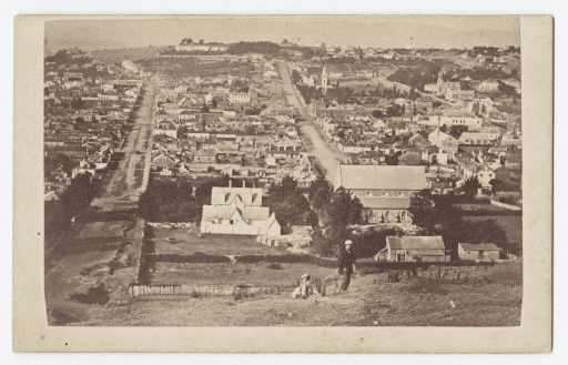 Back of the Church of Apostles large building right foreground. Launceston Views - East - Launceston from Cataract Hill. Photo by William Cawston, St John Street, Launceston. Awarded prize medal for architectural & landscape views, Melbourne, 1867. Launceston Library collection