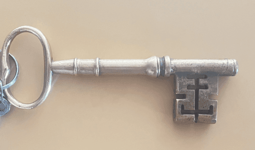 The brass front door key. Photograph taken September 2024