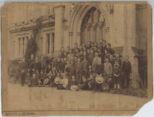 Photograph of a group of boys and masters outside Christ's College, (High School building) Domain circa. 1886-91, University of Tasmania